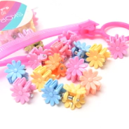 BROCHES FLORCITAS EN BOLSITA SKORA